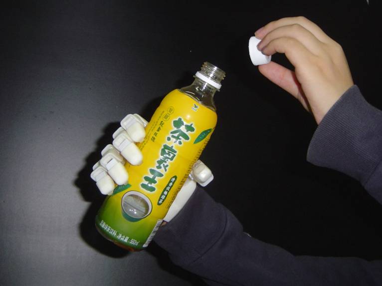 Under-Actuated Self-Adaptive Bionic Robotic Hand1